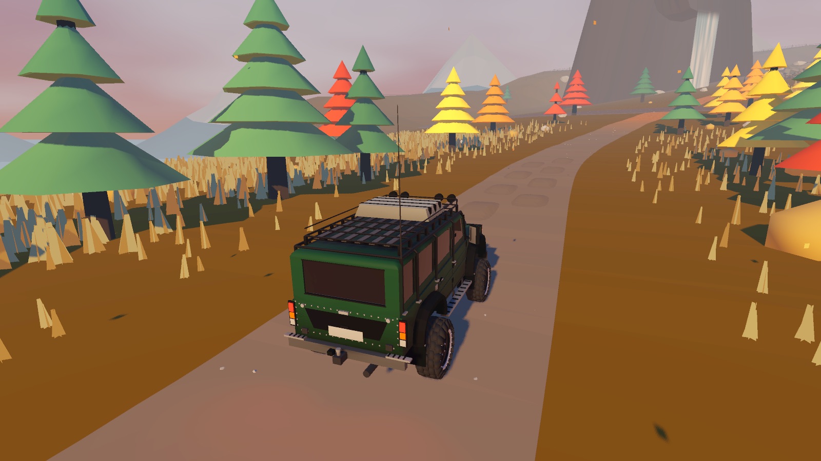 An autumn forest road with red and gold trees
